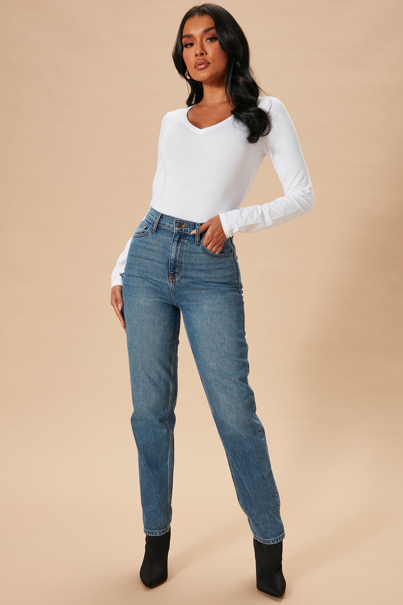 Voted Most Liked Bodysuit - White